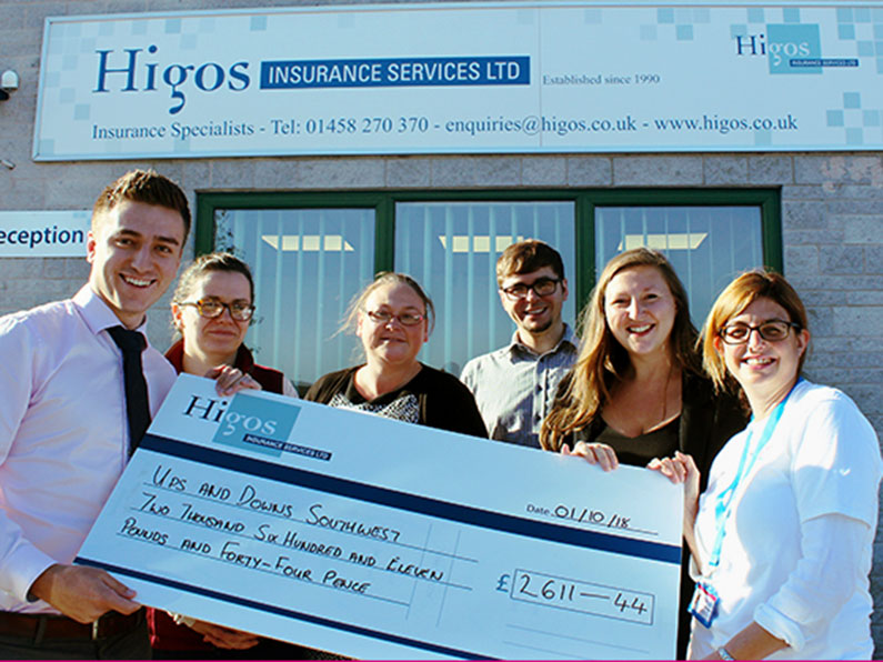 HIGOS Presenting a Cheque to Ups and Downs Southwest